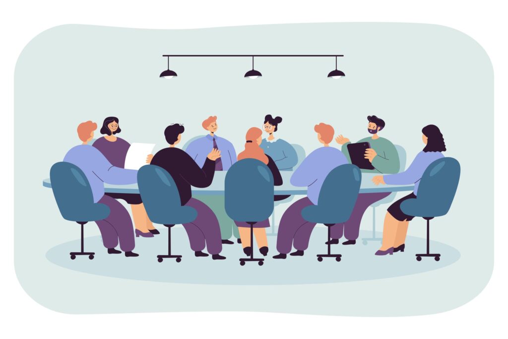 Réunion d'équipe autour d'une table en entreprise