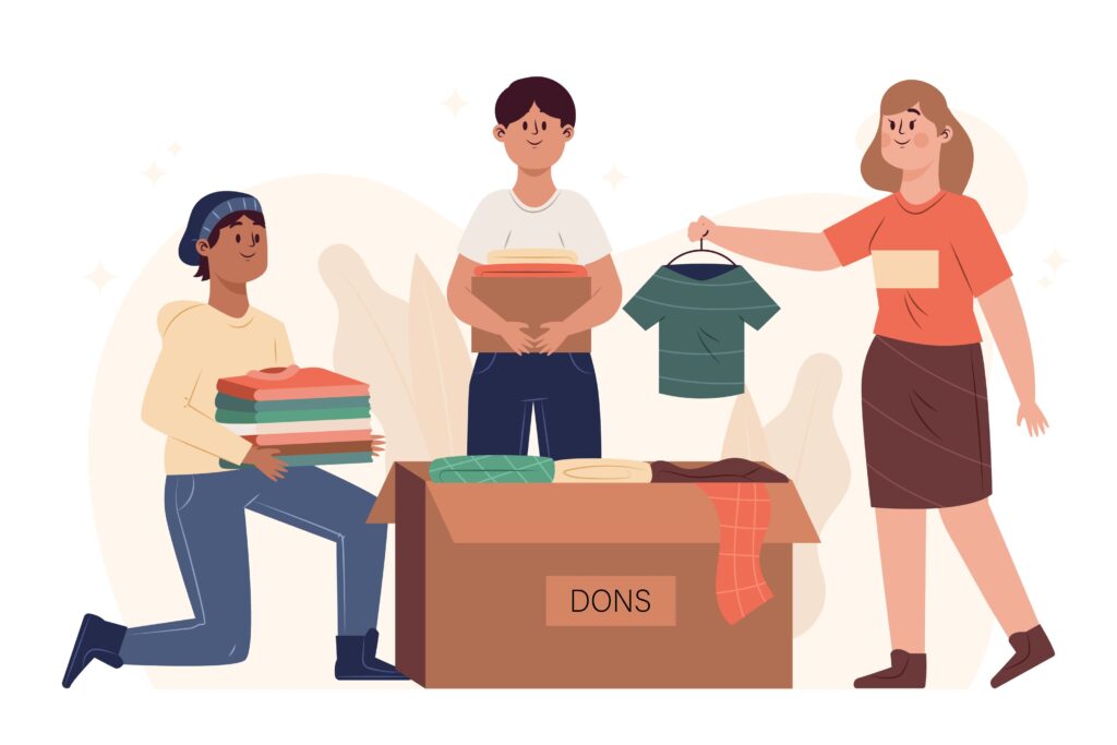 Personnes déposant des vêtements dans une boîte de dons