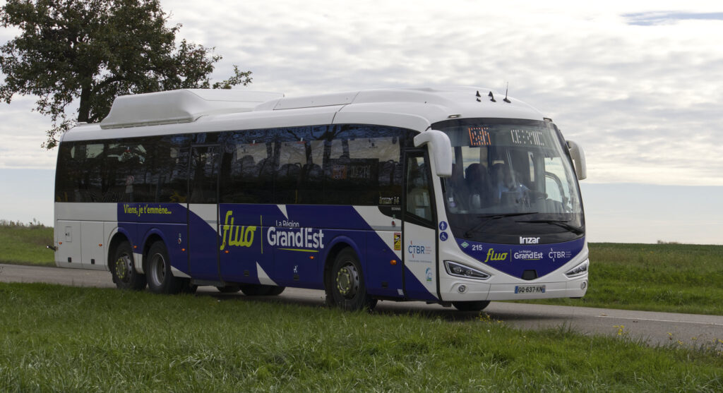 Regional Fluo Grand Est coach bus on rural road